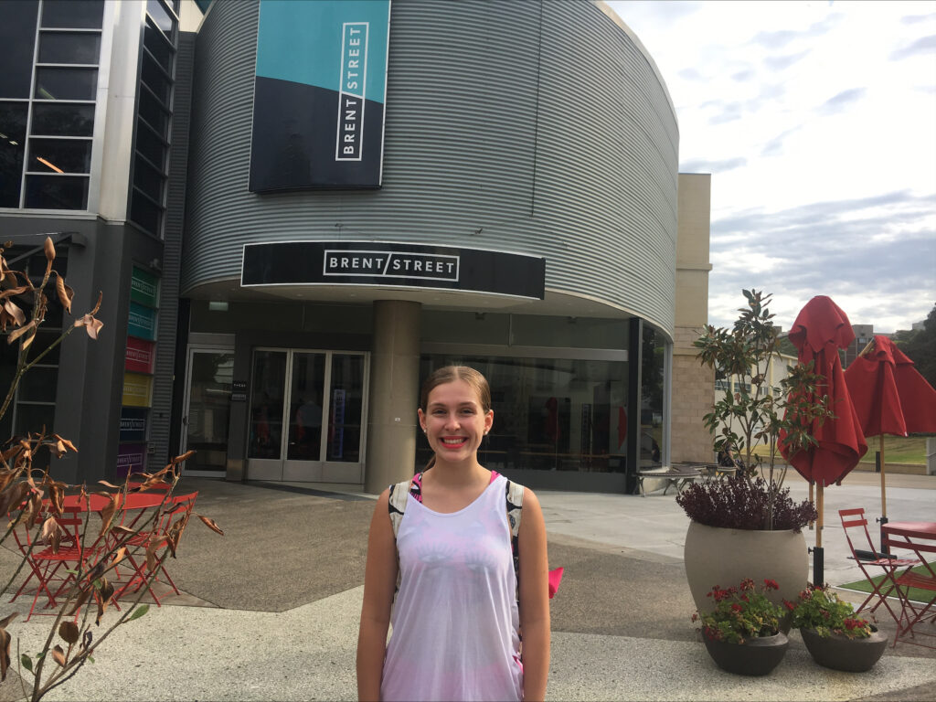 Abby in front of the Brent Street building.